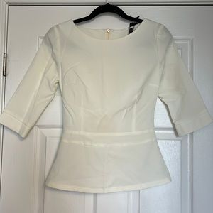 Brand new cream top. Size 4. With tags.